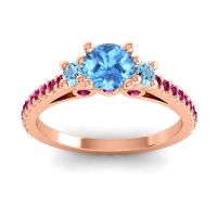 Swiss Blue Topaz Ring In 18K Rose Gold With Aquamarine And Ruby Navan Round Three-stone Ring