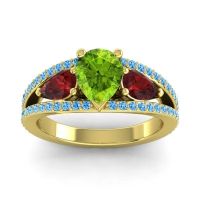 Peridot Ring In 14k Yellow Gold With Garnet And Swiss Blue Topaz Vatama Pear Three-stone Ring