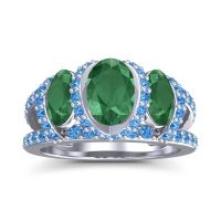 Emerald Ring In Palladium With Swiss Blue Topaz Vapra Oval Three-stone Ring