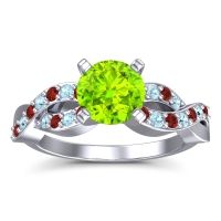 Peridot Ring In Palladium With Garnet And Aquamarine Kamini Round Modern Ring