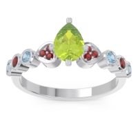 Peridot Ring In Palladium With Garnet And Aquamarine Tsaru Pear Modern Ring