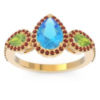 Swiss Blue Topaz Ring In 14k Yellow Gold With Peridot And Garnet Varsana Pear Three-stone Ring