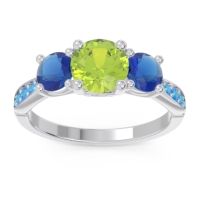 Peridot Ring In Palladium With Blue Sapphire And Swiss Blue Topaz Zasti Round Three-stone Ring
