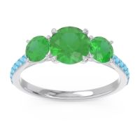 Emerald Ring In Palladium With Swiss Blue Topaz Trivisti Round Three-stone Ring