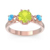 Peridot Ring In 18K Rose Gold With Ruby And Swiss Blue Topaz Taraggana Round Three-stone Ring
