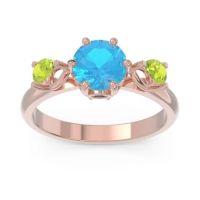 Swiss Blue Topaz Ring In 18K Rose Gold With Black Onyx And Peridot Taraggana Round Three-stone Ring